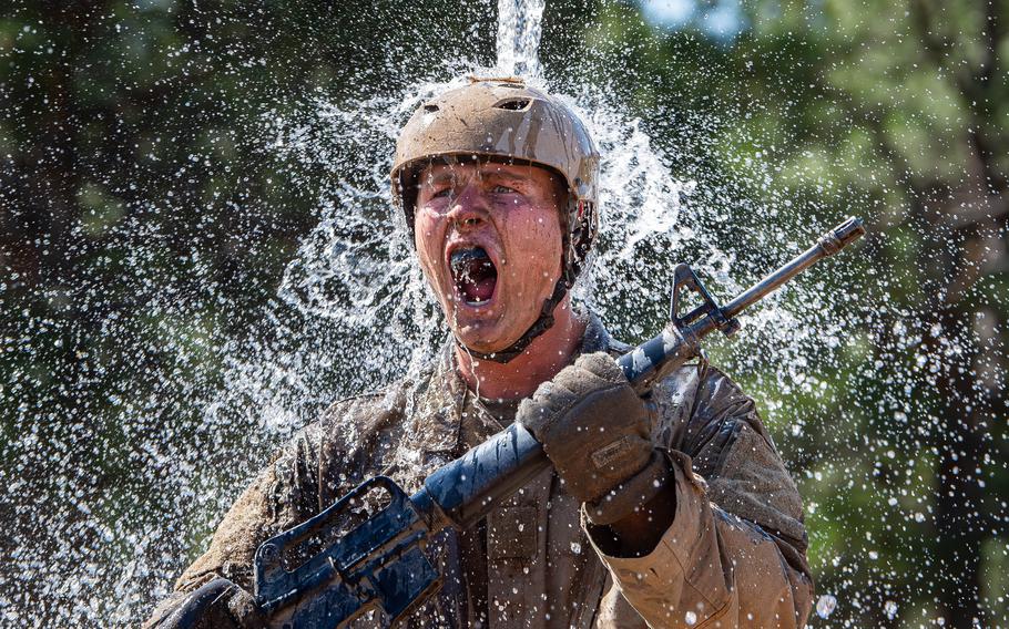 Water splashes on a cadet