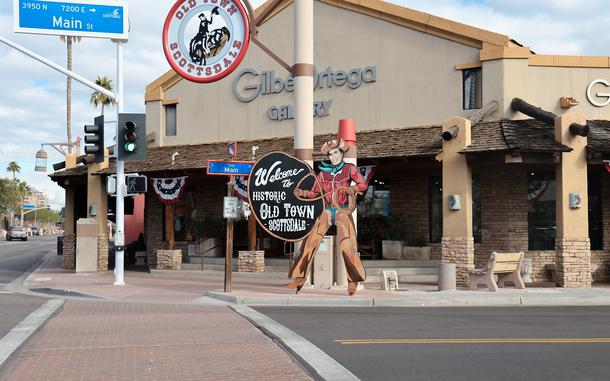Old Town Scottsdale’s iconic cowboy sign. Old Town is where the city began in the late 1800s. Its Old West flair is apparent day and night.