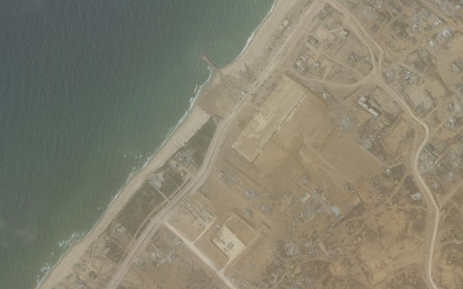 This satellite picture taken by Planet Labs PBC shows the construction of a new aid port near Gaza City, Gaza Strip, on April 18, 2024. 