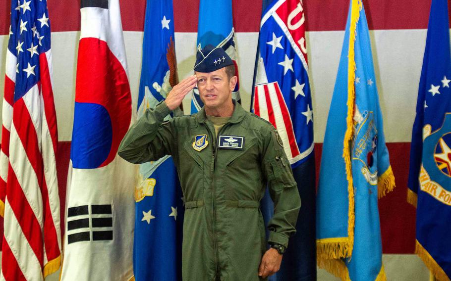 The new leader of 7th Air Force, Lt. Gen. David Iverson, salutes his airmen during a change-of-command ceremony at Osan Air Base, South Korea, Jan. 30, 2024. 
