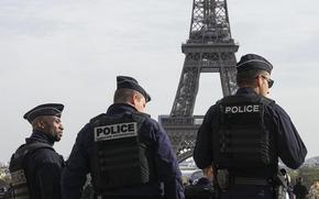 Police officers patrol the Trocadero plaza near the Eiffel Tower in Paris, Tuesday, Oct. 17, 2023. France says it has asked 46 countries if they can supply more than 2,000 police officers to help secure the Paris Olympics. Organizers are finalizing security planning for the July 26-Aug. 11 Games, the French capital’s first in a century. 