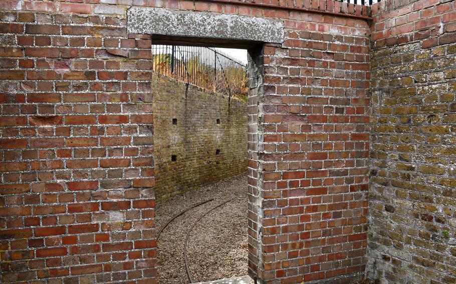 The remnants of a railway that was used to carry underwater mines from the annex building at the Landguard Fort out to the beach along the North Sea in Felixstowe, England.