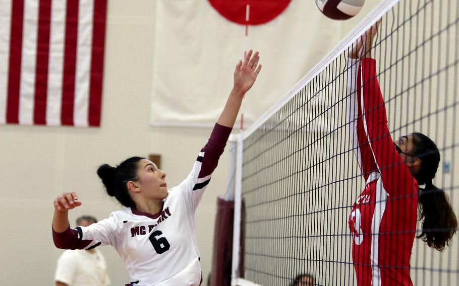 Matthew C. Perry's Chelsea Campbell tries to play the ball past Nile C. Kinnick's Cierra San Nicolas during Saturday's Japan girls volleyball match. The Red Devils won in straight sets.