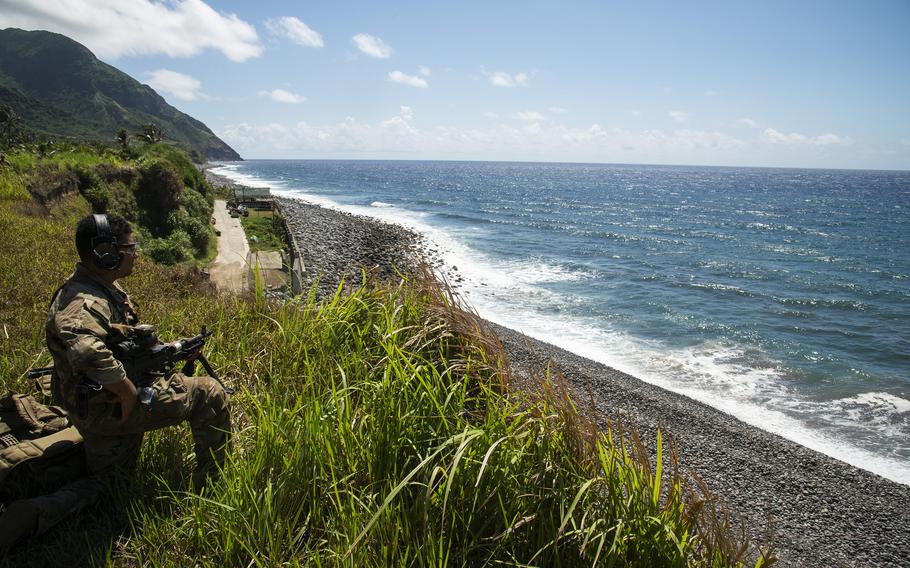 Pfc. Jorze Jauand, a 25th Infantry Division infantryman, secures an area during a Balikatan air-assault drill on Batan Island, Philippines, May 5, 2024.