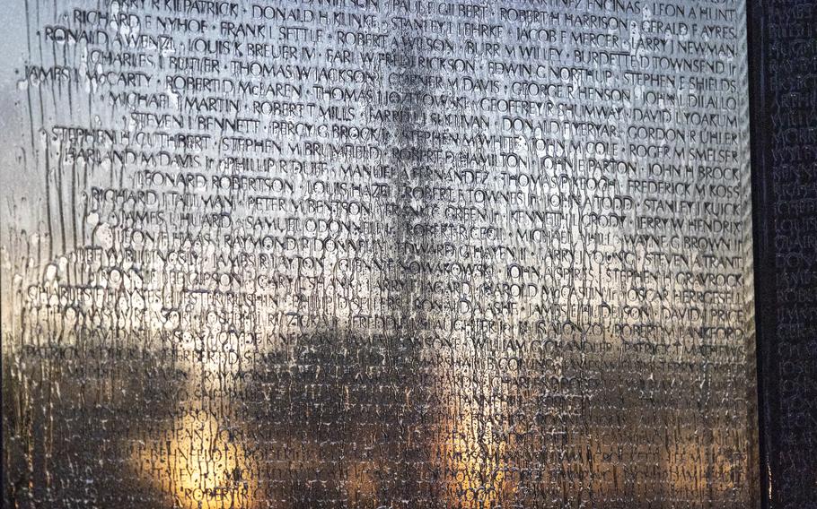 Volunteers wash Vietnam Veterans Memorial ahead of Veterans Day Stars