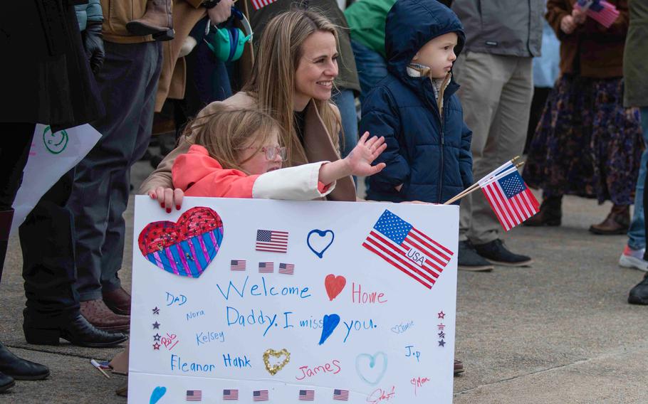 Family members wait for the return of Strike Fighter Squadron (VFA) 213, “Blacklions,” during their homecoming flight to Naval Air Station Oceana, Jan. 15, 2024.