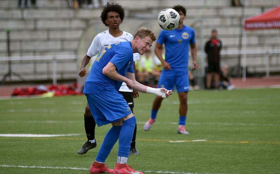 Ramstein striker Joseph Yost heads the ball during a Division I semifinal match against Kaiserslautern at the 2025 DODEA European championships on May 21, 2025, at Kaiserslautern High School in Kaiserslautern, Germany.