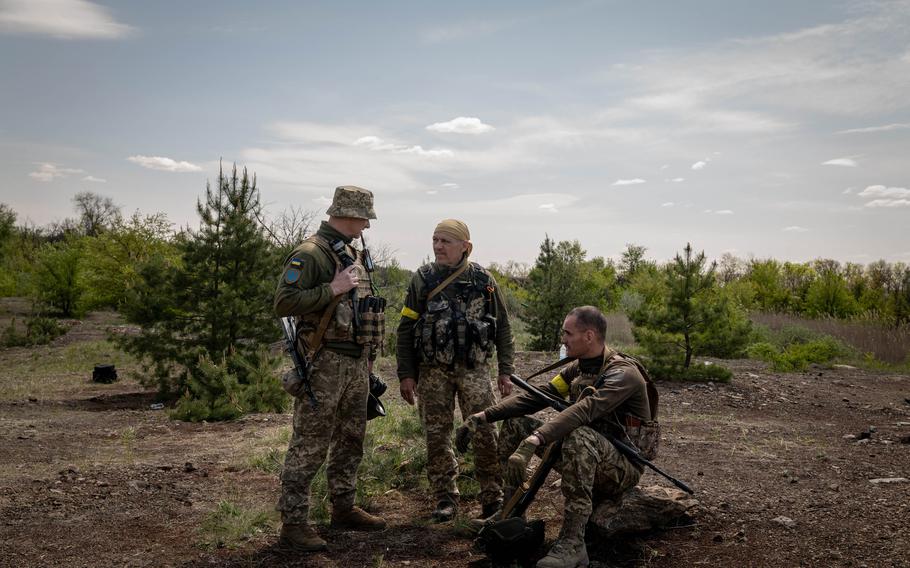 Members of a Zaporizhzhia territorial defense battalion take part in weapons training at a site in the Zaporizhzhia Oblast, Ukraine, on Wednesday, May 11, 2022.