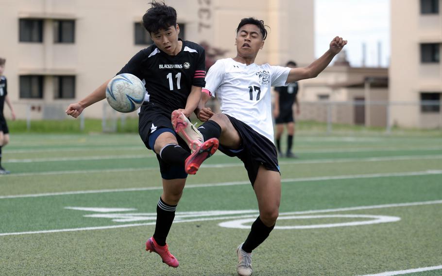 Tony Oh, right, scored one goal and assisted on another for Humphreys. Jose Rivera, left, accounted for the Cougars’ lone goal on a penalty kick.