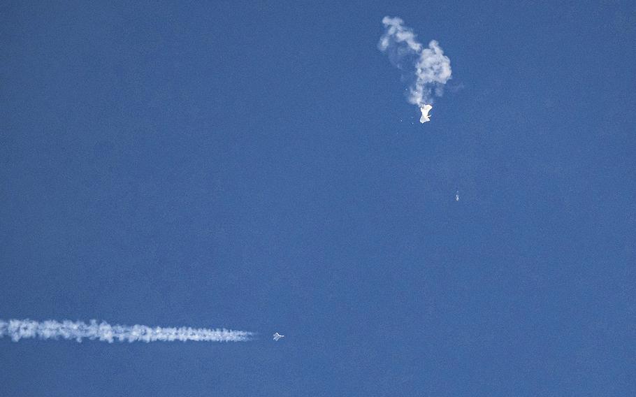 Debris falling from the sky after a Chinese spy balloon was shot down by an F-22 fighter jet over Surfside Beach, South Carolina, on Feb. 4, 2023. 