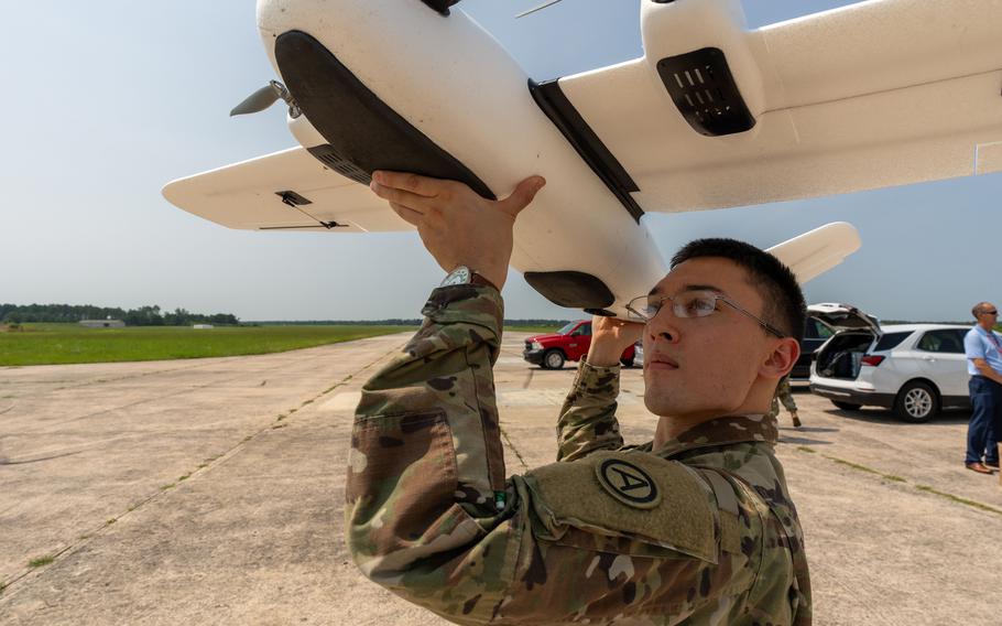 Army Sgt. Mickey Reeve demonstrates a drone launch ahead of testing of the Carpe Dronvm app at McEntire Joint National Guard Base, S.C., on July 17, 2023. 
