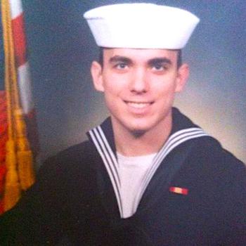 Juan Saro poses in his Navy uniform.