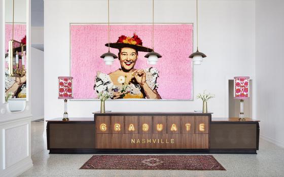 An 8-by-15-foot portrait of Grand Ole Opry star Minnie Pearl greets guests at the Graduate Nashville hotel. 