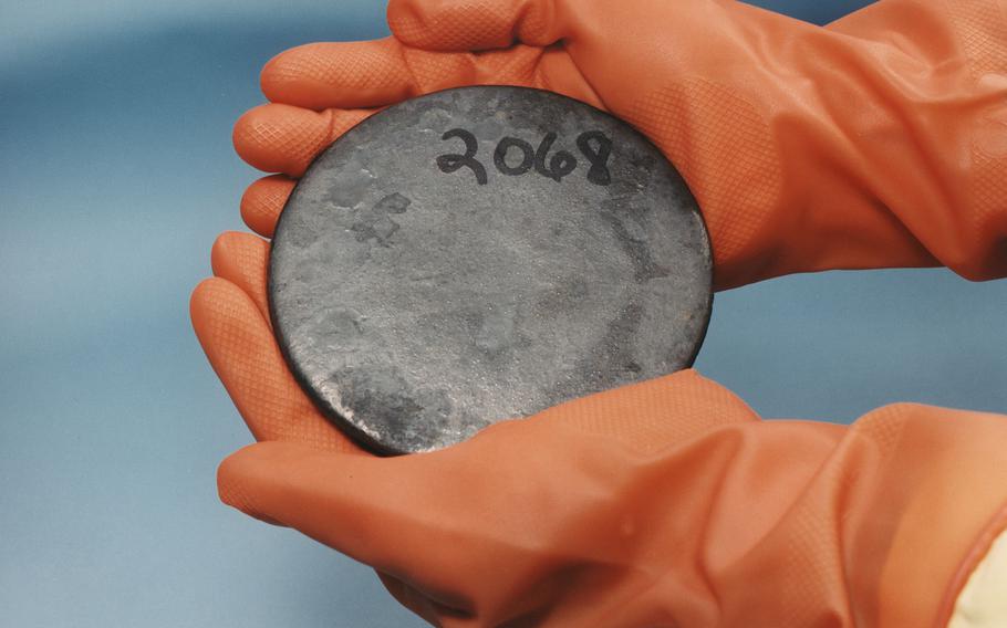 A billet of highly enriched uranium that was recovered from scrap processed at the Y-12 National Security Complex Plant.