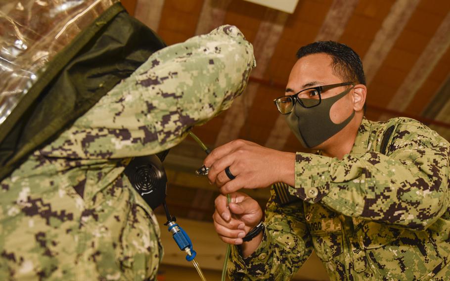Petty Officer 2nd Class Nathan Gogo, Naval Support Activity Naples, conducts maintenance on a mask leakage testing device in the air terminal at Capodichino in Naples, Aug. 28, 2020. Personnel at all NSA Naples facilities will no longer have to wear a mask outdoors if social distancing of at least 6 feet can be maintained. 