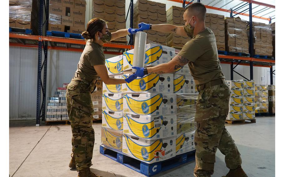 Florida National Guard personnel wrap pallets of food at Feeding South Florida in Boynton Beach in early 2020. The Guard may be getting some help dealing with the aftermaths of hurricanes and other relief efforts as Gov. Ron DeSantis seeks to revive the long-idled volunteer Florida State Defense Force, which was deactivated in 1947.