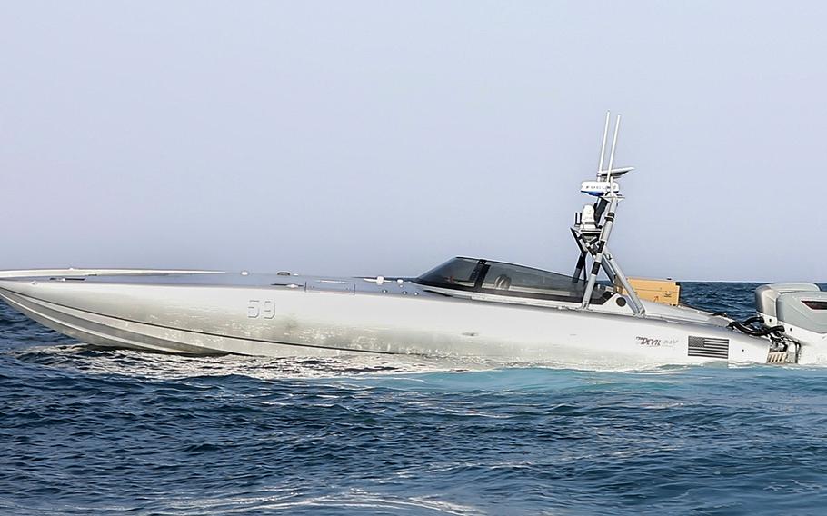 A T-38 Devil Ray unmanned surface vessel armed with missiles operates during exercise Digital Talon 2 in the Persian Gulf, Nov. 27, 2023.