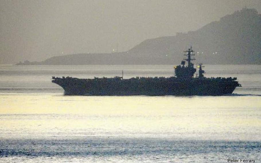 The USS Dwight D. Eisenhower Nimitz-class aircraft carrier is seen eastbound in the Strait of Gibraltar, according to a post by @WarshipCam on the social media platform X, formerly Twitter. The Eisenhower Carrier Strike Group is on its way to the Middle East.