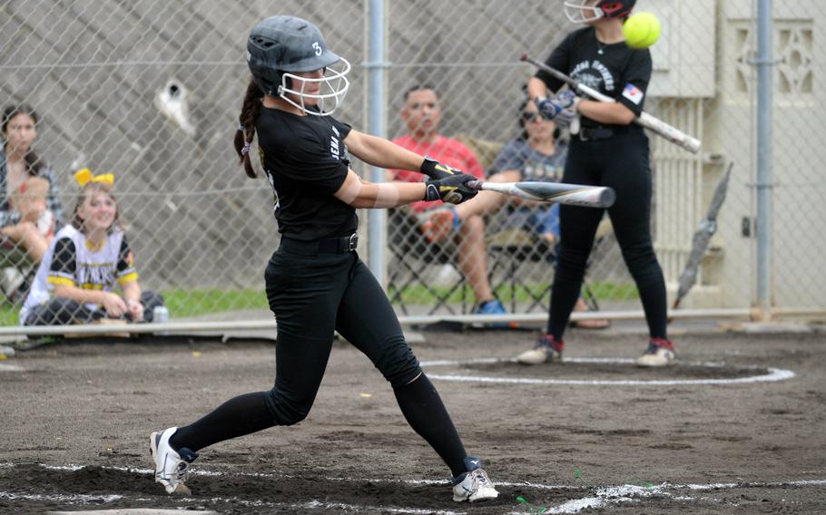 Kadena's Julia Petruff connects for a double against Kubasaki during Tuesday's Okinawa softball regular-season finale. The Panthers won 14-1 to wrap up an 8-0 regular season over the Dragons.