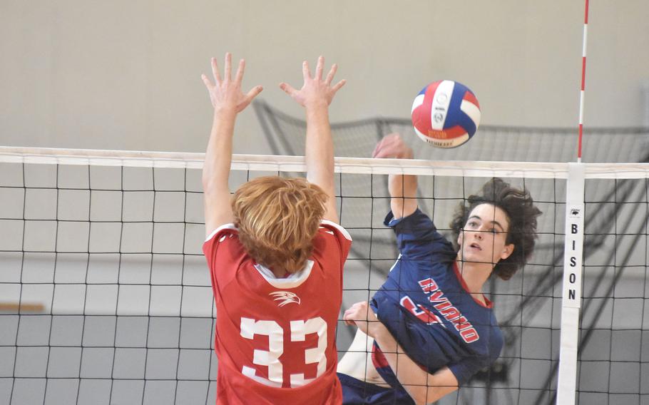 Aviano's Gabriel Fabbro gets a shot past American Overseas School of Rome's Anthony DiMatteo on Saturday, Oct. 15, 2022, in the Saints victory over the Falcons.