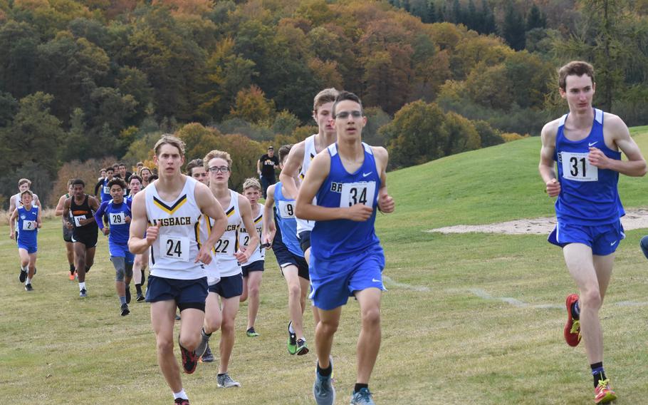 A pack of runners spread out while running the first of two loops at the Baumholder Rolling Hills Golf Course on Saturday, Oct. 23, 2021. DODEA-Europe held its cross country championships in Germany for teams north of the Alps. Italy held a separate meet for its schools in Vicenza.