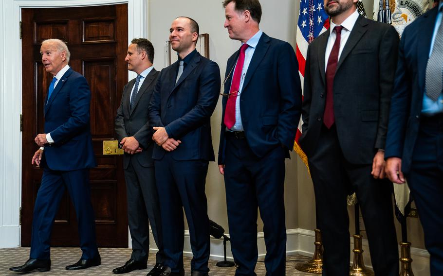 Tech leaders meet with President Biden to discuss artificial intelligence at the White House in July 2023. 