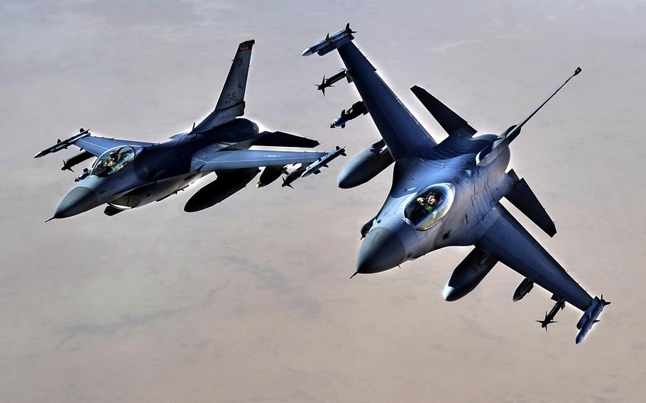 Two U.S. Air Force F-16 Fighting Falcons from the 125th Expeditionary Fighter Squadron fly over Iraq, Nov. 9, 2011, providing top cover for U.S. forces as they transition personnel and equipment out of the country. The 125th EFS consists of F-16s, pilots, maintenance specialists and support personnel from the Oklahoma Air National Guard’s 138th Fighter Wing in Tulsa, Okla., the Ohio Air National Guard’s 180th Fighter Wing in Toledo, Ohio, and the Arizona Air National Guard’s 162nd Fighter Wing in Tucson, Ariz.