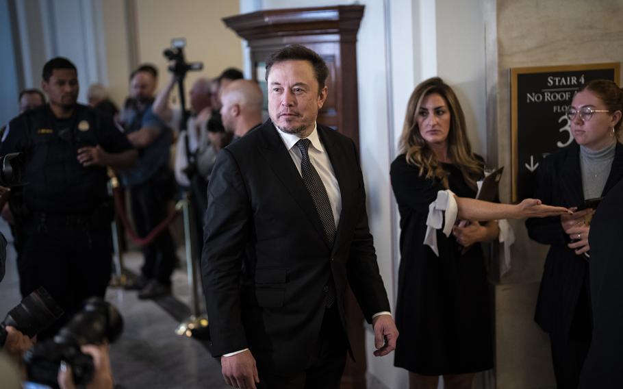 Elon Musk arrives for the forum on Capitol Hill on Wednesday, Sept. 13, 2023.
