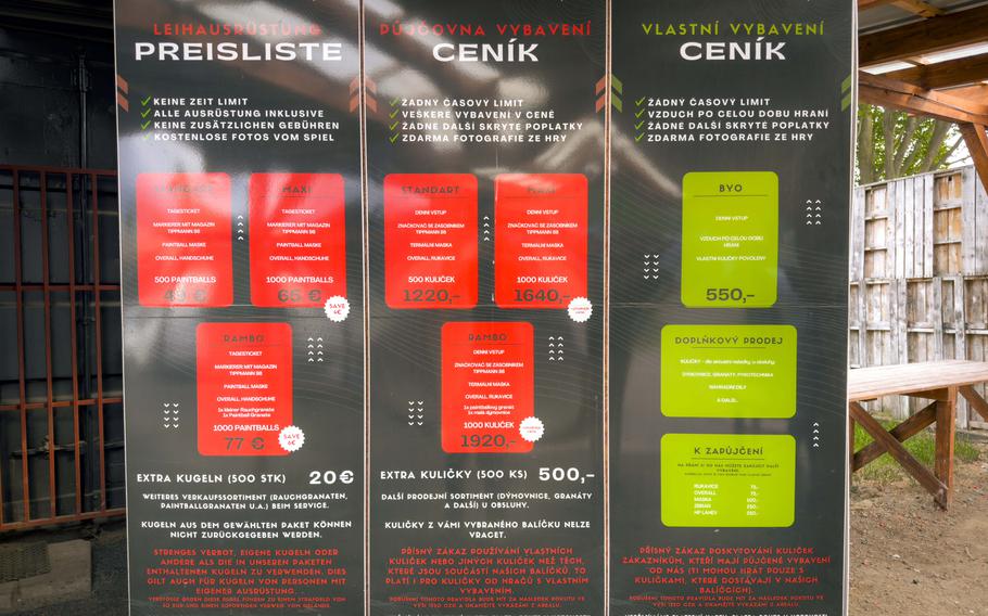 A board shows the various prices for playing at the Paintball Arena.