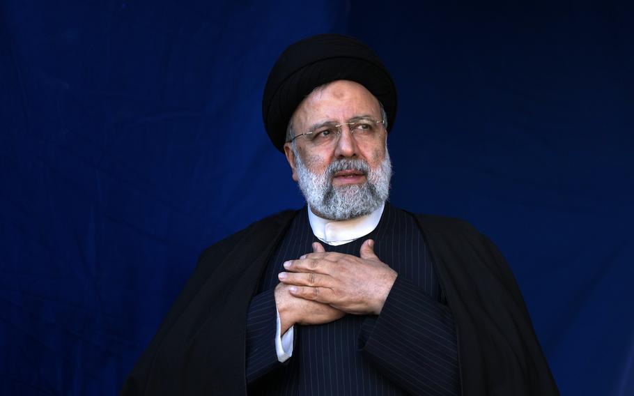 Iranian President Ebrahim Raisi places his hands on his heart as a gesture of respect to the crowd during the funeral ceremony of the victims of Wednesday's bomb explosion in the city of Kerman about 510 miles southeast of the capital Tehran, Iran, Jan. 5, 2024. A helicopter carrying Iranian President Ebrahim Raisi suffered a “hard landing” on Sunday, May 19, 2024, Iranian state television reported, without immediately elaborating.