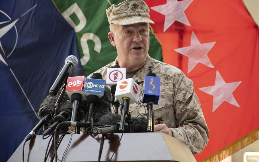 Marine Corps Gen. Frank McKenzie speaks at a ceremony in Kabul, Afghanistan on Monday, July 12, 2021, during which he took command of U.S. forces in Afghanistan from Army Gen. Scott Miller. 