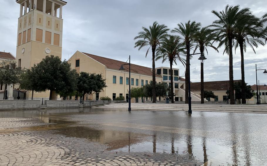 Standing water remained in only a few scattered areas of Naval Air Station Sigonella, including this courtyard near the base's chapel, Oct. 30, 2021.