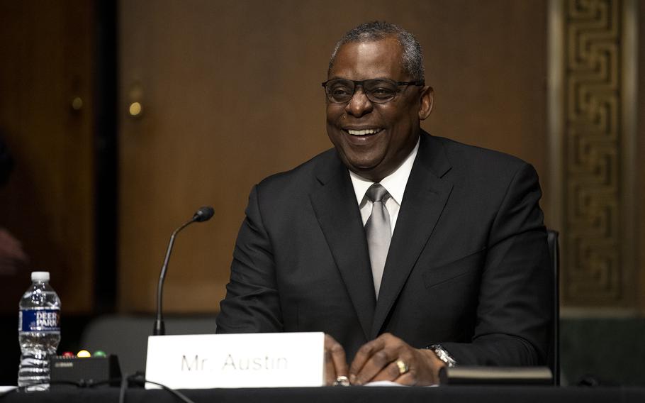 Defense Secretary Lloyd Austin reacts to a question during a Senate Armed Forces Committee hearing in 2021. 