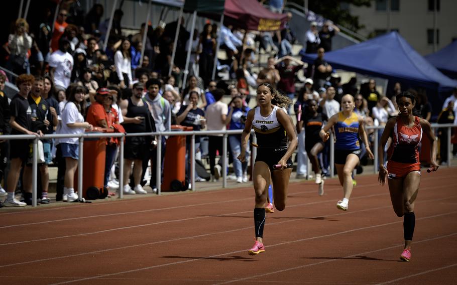 Stuttgart’s Anika Smith leads the field during the girls 4x100 meter relay finals at the 2024 DODEA European Championships at Kaiserslautern High School in Kaiserslautern, Germany, on May 24, 2024.