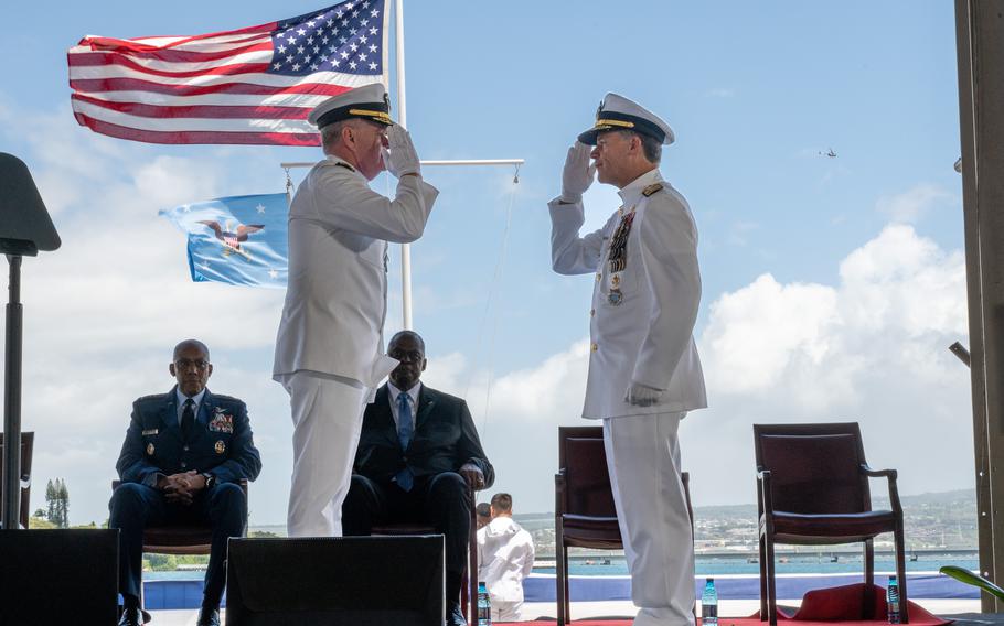 Adm. John Aquilino, right, outgoing commander of U.S. Indo-Pacific Command, and Adm. Samuel Paparo, incoming commander of  U.S. Indo-Pacific Command, exchange salutes during the change of command ceremony on Joint Base Pearl Harbor-Hickam, May 3, 2024.