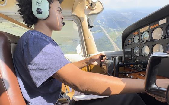 In a frame grab from video, Kyan Bovee flies over Detroit, Tuesday, Sept. 5, 2023. The Detroit teen is part of a program that teaches young people how to fly, while exposing them to careers in aviation and as pilots — areas where people of color traditionally are underrepresented.