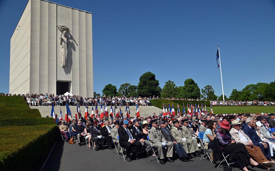 Digneteries watch the Memorial Day ceremony at Lorraine American Cemetery in St. Avold, France, May 28, 2023. Hundreds of Americans and French attended on a sunny day in eastern France.