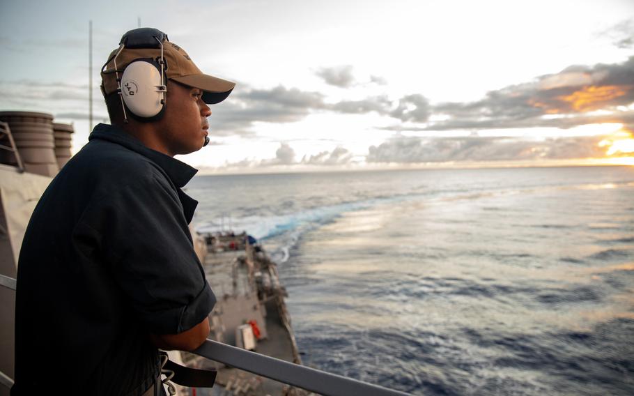 A sailor stands look out on the USS Hopper as it steams through the Philippine Sea on Oct. 30, 2023. The Hawaii-based USS Hopper sailed near the Paracel Islands to assert “navigational rights and freedoms,” the U.S. 7th Fleet announced Sunday in a news release. 
