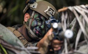 Lance Cpl. Armando Floreslopez, an infantry rifleman with Marine Rotational Force-Darwin, takes part in a counter-landing, live-fire rehearsal in Palawan, Philippines, April 27, 2025.