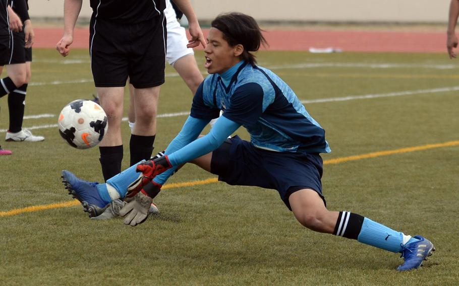 Zama goalkeeper Marques Cuffie makes a stop of a Yokota corner kick during Friday’s Perry Cup soccer matches. The Panthers won 3-1.