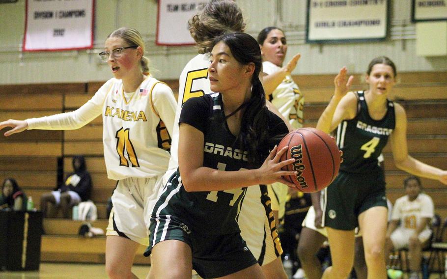 Kubasaki's Jessica Blackston looks for an outlet against Kadena during Friday's DODEA-Okinawa girls basketball game. The Panthers won 44-40, leveling the season series 1-1.