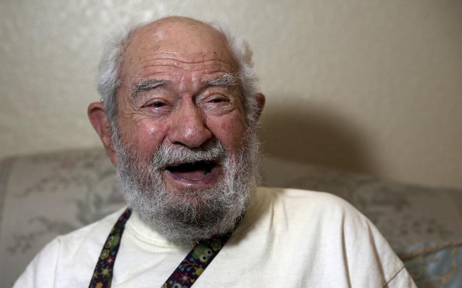 U.S. Army Air Corps veteran and ex-prisoner of war Vincent Shank, then-103, talks at his Las Vegas home on Dec. 11, 2019, about his time in POW camps in Italy and Germany during World War II.