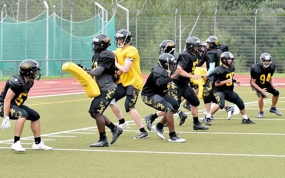 Stuttgart players participate in a drill during a practice on Aug. 28, 2023, at Stuttgart High School in Boeblingen, Germany.