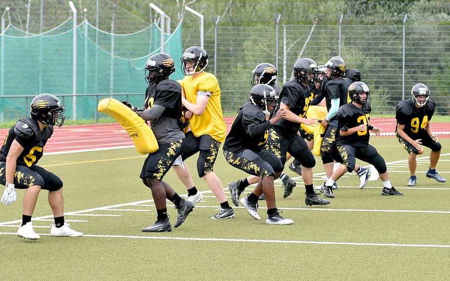 Stuttgart players participate in a drill during a practice on Aug. 28, 2023, at Stuttgart High School in Boeblingen, Germany.