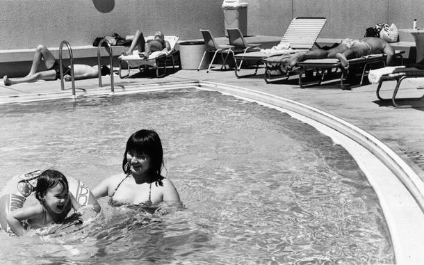 Hed: Feels like summer, 1984

Tokyo, Japan, Sep. 9, 1984:  Makiko (left) and Kuniko Clark play in the pool of the New Sanno Hotel in Tokyo, Japan as other guests sunbathe on the stretchers surrounding the pool. The New Sanno opened in October 1984 after eight years of planning and nearly three years of construction. 

Looking for Stars and Stripes’ coverage of overseas military life through the decades? Subscribe to Stars and Stripes’ historic newspaper archive! We have digitized our 1948-1999 European and Pacific editions, as well as several of our WWII editions and made them available online through https://starsandstripes.newspaperarchive.com/

META TAGS: Pacific; Japan; hospitality industry; New Sanno Hotel; military life; leisure; pool; swimming