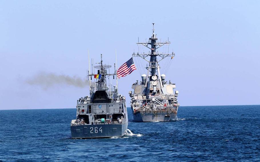 A Romanian ship and the USS Porter sail together in the Black Sea during Exercise Sea Breeze 2020, hosted by the U.S. and Ukraine. The U.S. has spent the most time patrolling the Black Sea among its NATO allies, but overall presence has dropped since 2014, according to a Stars and Stripes data analysis.