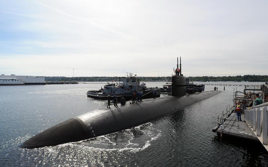 The Los Angeles-class attack submarine USS Bremerton (SSN 698) returns to its namesake at Naval Base Kitsap’s Pier Delta on May 25, 2012.