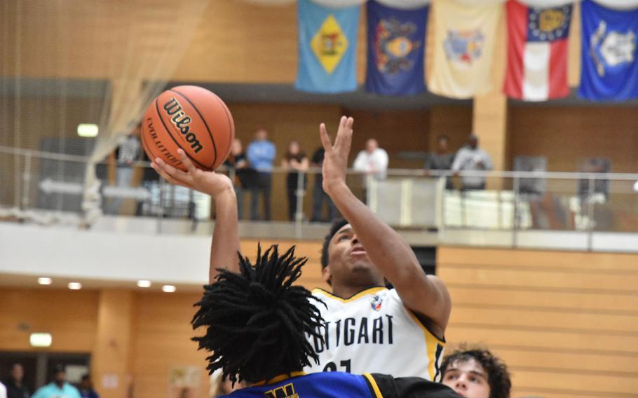 Stuttgart’s Alex Guthrie puts up a shot Friday, Feb. 16, 2024, in a Division I semifinal game at the DODEA European Basketball Championships in Wiesbaden, Germany.
