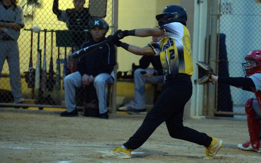 Kadena's Hajime Reed connects for a two-run double to right-center field against Kubasaki during Monday's DODEA-Okinawa season-opening baseball game. The Panthers rallied to win 10-8.