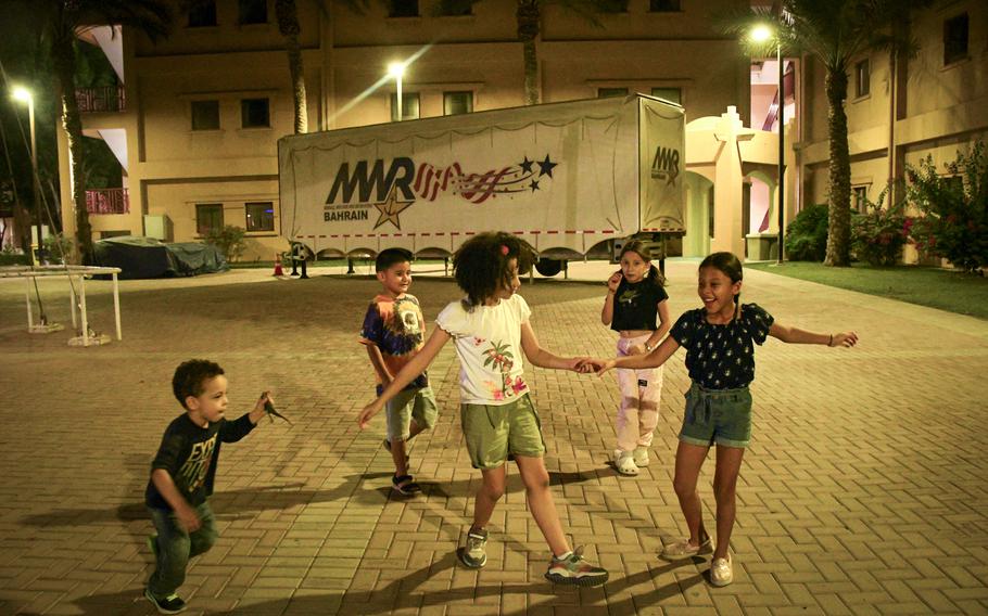 Children accompanying troops and civilians deployed to Naval Support Activity Bahrain play on base on Nov. 16, 2023, amid off-base travel restrictions in the wake of the Israel-Hamas war.